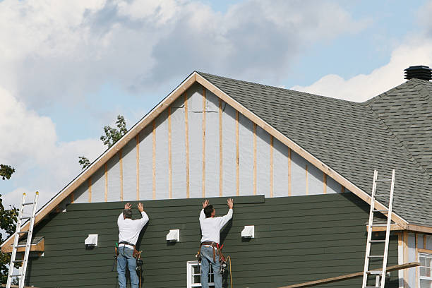 Professional Siding Contractor technician working in Oak Hall, VA